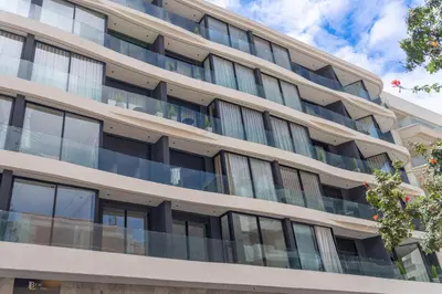 an apartment building with balconies on the side at Twenty Four Inn 304 in Casablanca