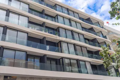 an apartment building with balconies on the side at Twenty Four Inn 303 in Casablanca