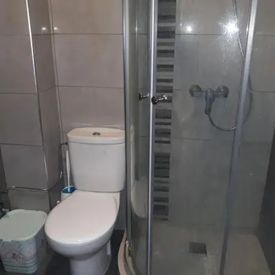 a bathroom with a toilet and a shower at Appartement Sidi Rahal in Berrechid