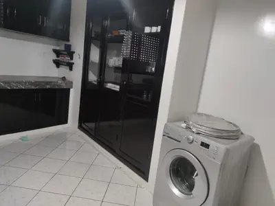 a washer and dryer in a room at Appartement de standing in Casablanca