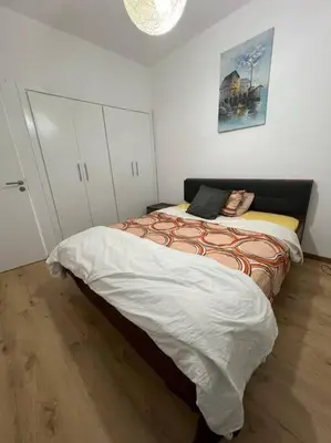 a bedroom with a bed in a room at Appartement de Luxe à Bahia Golf Beach Spacieux de 126 m in Bouznika