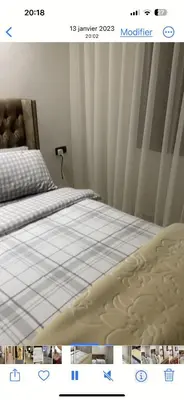 a picture of a bed in a bedroom at Charmant appartement in Casablanca
