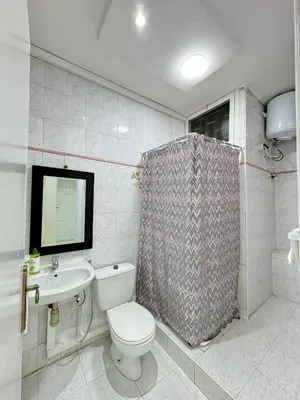 a bathroom with a toilet and a sink at SUITOUISS - Agdal - Studio en plein cœur de Rabat à 5 minutes du grand mall Arribat Center - centre ville in Rabat