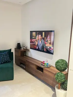 a living room with a flat screen tv on a wall at Studio4 Comfortable rest in Casablanca