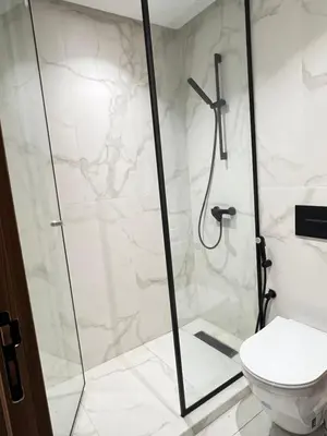 a bathroom with a shower and a toilet at Studio4 Comfortable rest in Casablanca
