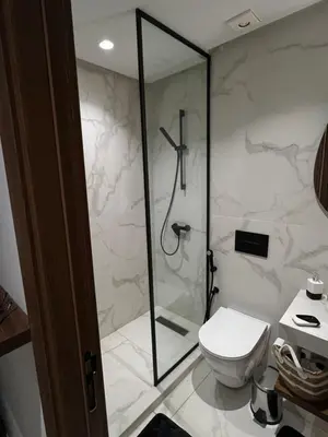 a bathroom with a shower and a toilet at Studio4 Comfortable rest in Casablanca
