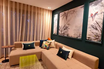 a living room with a couch with pillows on it at studio ghandi in Casablanca
