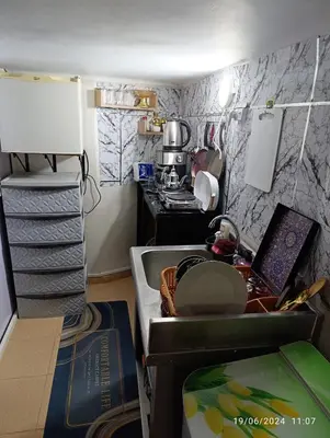 a kitchen with a sink and a stove top oven at Alone Studio in Casablanca