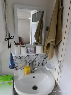a bathroom with a sink and a mirror at Alone Studio in Casablanca