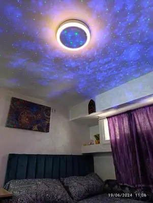 a ceiling with a painting of a starry sky at Alone Studio in Casablanca
