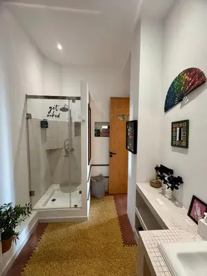 a bathroom with a shower and a sink at Loft art-déco centre-ville Casa in Casablanca