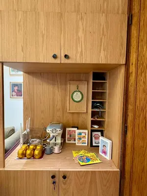 a wooden cupboard with food and other items on it at Loft art-déco centre-ville Casa in Casablanca