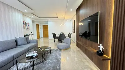 a living room with a couch and a table at Dreamy 3BR with Terrace -AppartAli Luxury Platform in Casablanca