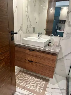 a bathroom with a sink and a mirror at Studio lotus CFC n 21 in Casablanca