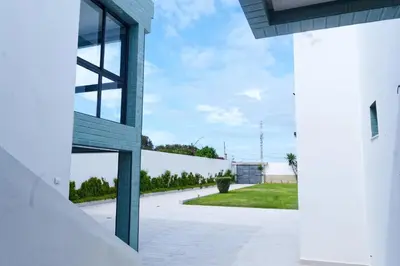 an external view of a building with a courtyard at Villa Luxe Dar Bouazza - Piscine Privée - Fibre 100Mb - 3 min Plage in Casablanca
