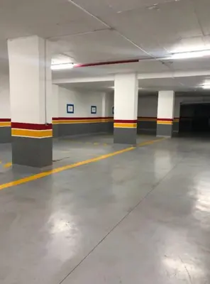 an empty parking garage with columns and a parking lot at Zafiro - L'appartement de vos rêves - Casablanca in Casablanca