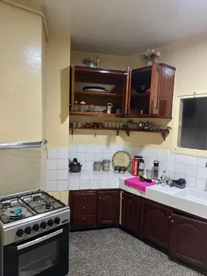 a kitchen with a stove and a stove top oven at Chambre cosy au cœur de Rabat in Rabat
