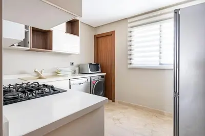 a kitchen with a stove top oven in a kitchen at TT holidays Casa Oasis in Casablanca