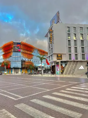 an empty parking lot in front of some buildings at D2 L'Art de Vivre Urbain au Cœur de Casablanca maarif in Casablanca