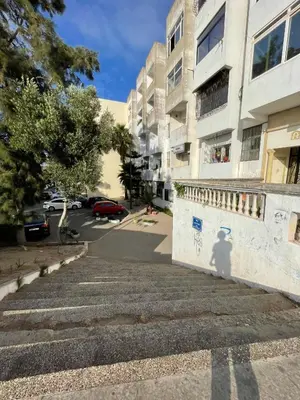a fire hydrant on the side of a building at Chambre Privée en plein centre de Rabat Agdal in Rabat