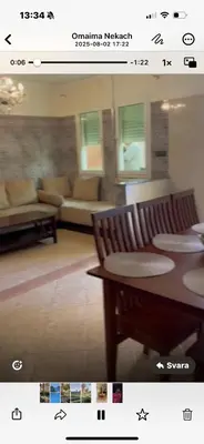 a picture of a living room with a table and chairs at Sahara beach Mansouria in Mansouria