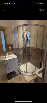a bathroom with a shower and a toilet at Bouznika, Shems Kettani in Bouznika