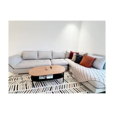 a living room with a couch and a coffee table at Bostay in Casablanca