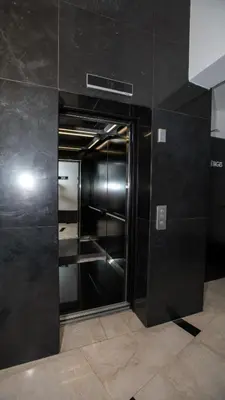 a room with black walls and a walk in closet at Haut Standing 2-Bedroom Apartment in Gauthier in Casablanca