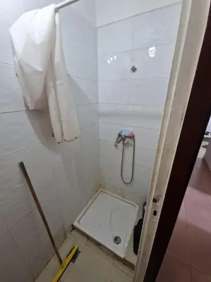 a bathroom with a shower with a hose in it at Appartement à Louer à Casablanca in Casablanca