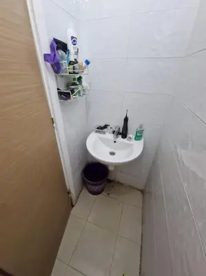 a small white bathroom with a sink in a room at Appartement à Louer à Casablanca in Casablanca