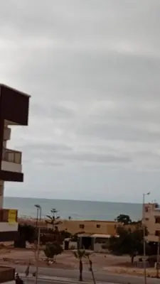 a view of the ocean from a building at Welcomeمرحبا in Casablanca