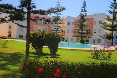 a view of the apartment complex from the garden at Mohammedia Appartement in Mohammedia