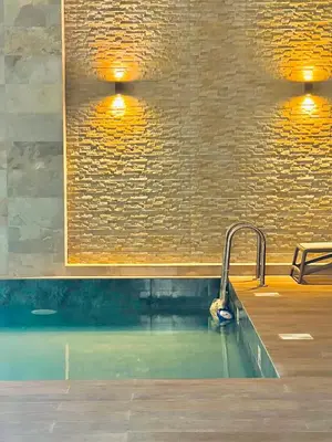 a swimming pool with a sink and a tap at Appartement Dahlia - Haut Standing - Mohammedia Natura Living in Mohammedia