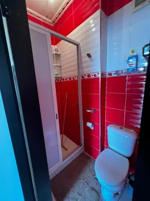 a bathroom with a toilet and a shower at Apartment à 1 min de Casanearshore in Casablanca