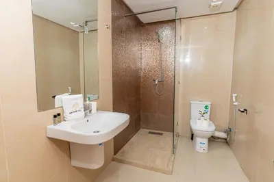 a bathroom with a sink and a shower and a toilet at Casa Streets 3 BR Terrace - AppartAli Luxury Platform in Casablanca