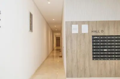 a hallway with a wall with a sign on it at Zenitude in Casablanca