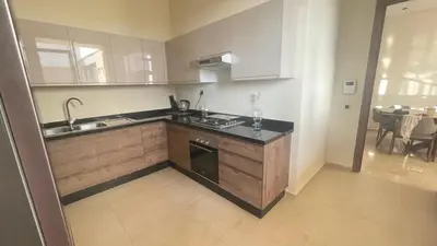 a kitchen with a sink and a stove top oven at Villa Elia in Tamaris
