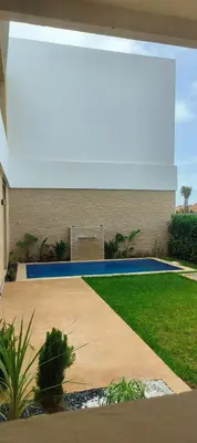 a view of a swimming pool in a backyard at Villa Elia in Tamaris