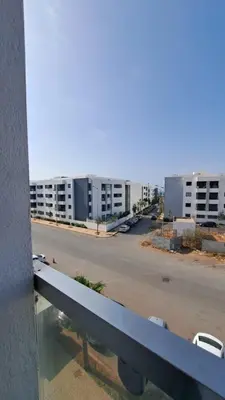 a view of an empty street from a building at Appart familial près de la plage Val d'or in El Harhoura