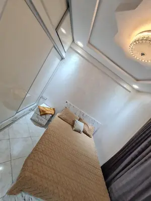 an overhead view of a room with a bed at Appartement perle de bouznika in Kasba Bou Hamira