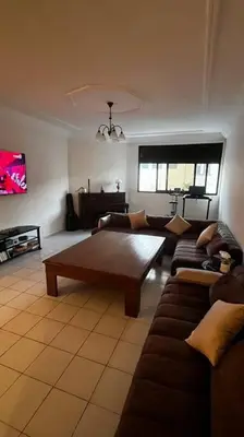 a living room with a couch and a coffee table at Modern meets traditional ! in Casablanca
