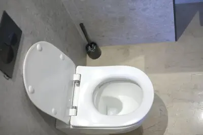 a bathroom with a white toilet in a stall at Studio cosy à Maârif, Palmiers in Maarif