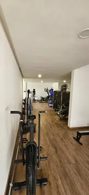 a gym with several treadmills and exercise bikes at le carrousel Rabat Océan in Kouas