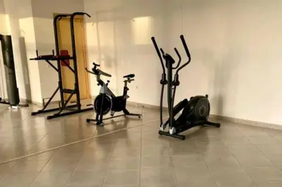 a gym with two exercise bikes in a room at Chic & Charme Studio Près de l'aéroport in Nouaceur