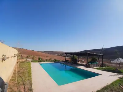 Gallery image of Rez-de-jardin piscine Benslimane in Ziaïda