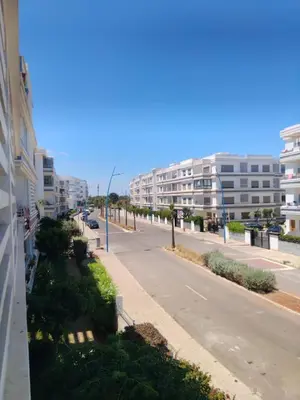 an empty street in a city with tall buildings at Appartement Confortable en Résidence Privée avec Piscine in Pont Blondin