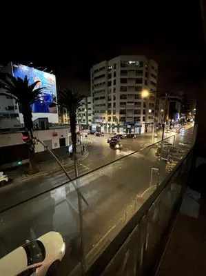 a view of a city street at night at Votre chez-vous à Casa, une ambiance cosy garantie in Casablanca