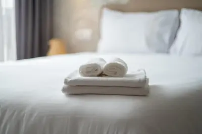 two towels sitting on top of a bed at Studio Raffiné en Centre Ville in Casablanca