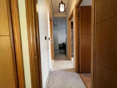 a hallway with a hallway leading to a room with a hallway at Appartement à 5min de Casanearshore in Casablanca