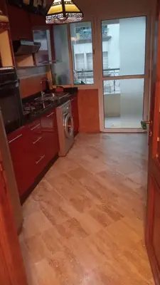 a kitchen with a washer and a sink and a stove at Appartement à Maarif in Casablanca